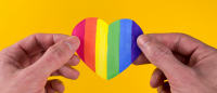 Hands holding heart.